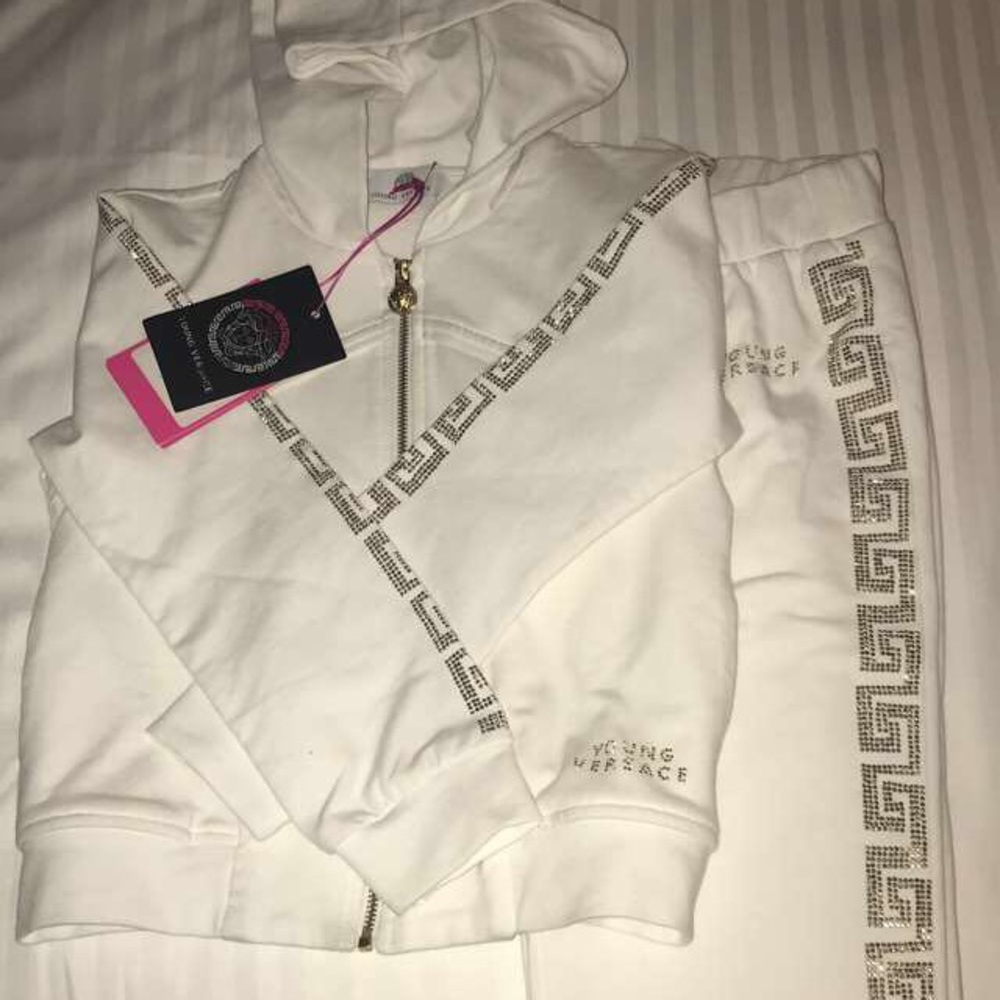 Young Versace sweat suit.
